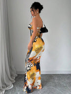 Selianne Sleeveless Twist Cutout Back Tie Up Bodycon Maxi Leopard Print Dress