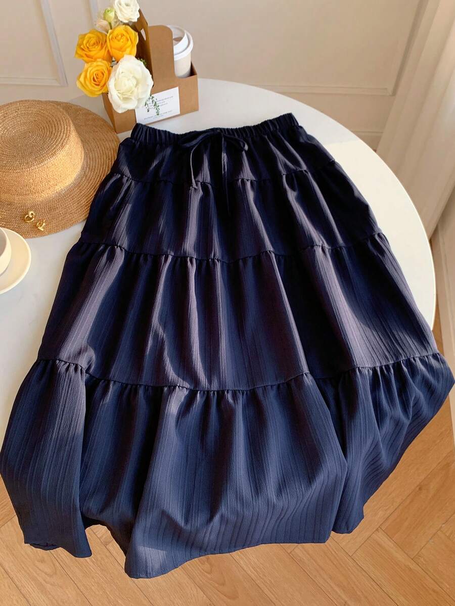 MainGRL Women Solid Color High Waist Tie Ruffled Hem Maxi Skirt